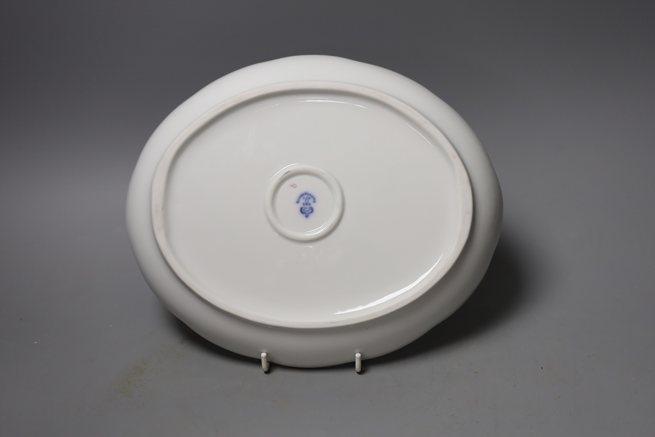 A Ludwigsburg porcelain floral oval dish, 24.5 cms wide